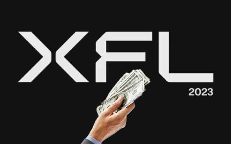 2023 XFL logo with a hand offering cash