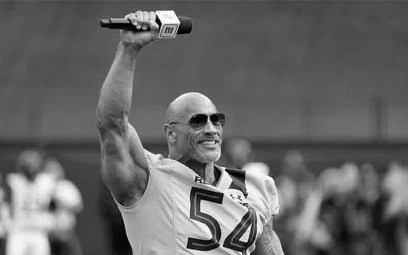 The Rock pumping his fist prior to an XFL game in 2023