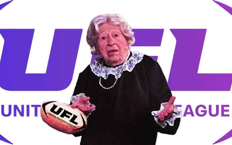 The where's the beef lady holding a bun with the UFL logo on it