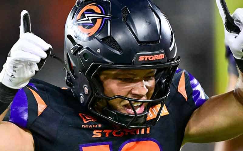a close up of a celebrating Orlando Storm player