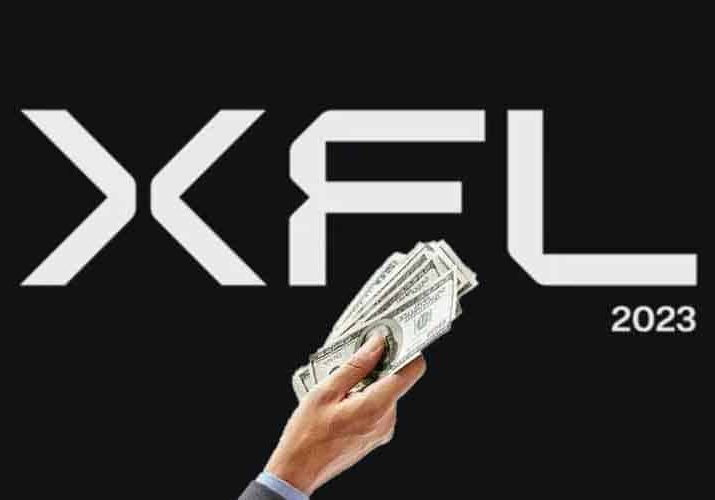 2023 XFL logo with a hand offering cash